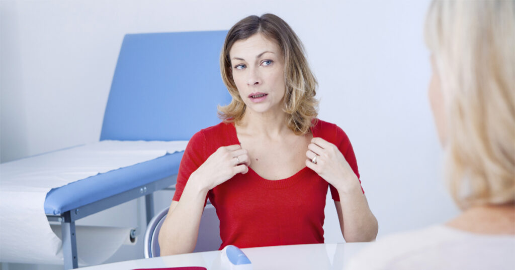 Hormone Therapy Consultation with a healthcare provider reviewing symptoms and personalized treatment options